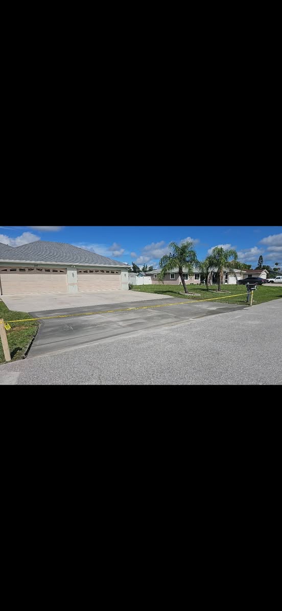 After — Concrete driveway renovation
